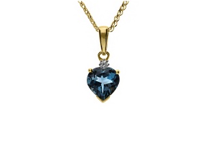 Złoty wisiorek próby 0,585 z topazem 1,3 ct i brylantem 0,02 ct