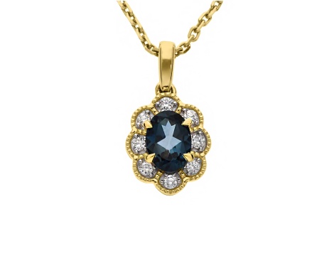 Złoty wisiorek próby 0,585 z London Blue tOPAZ 0,68 ct i brylantami 0,12 ct