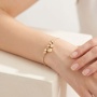 Złota bransoletka próby 0,585 z zawieszkami typu charms - 4